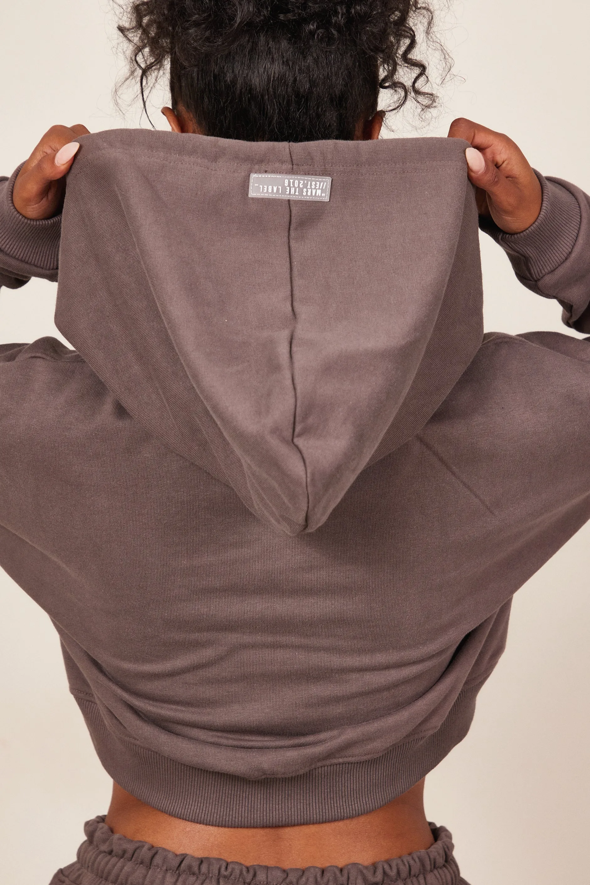 The Mars Curve Hem Zip Jacket