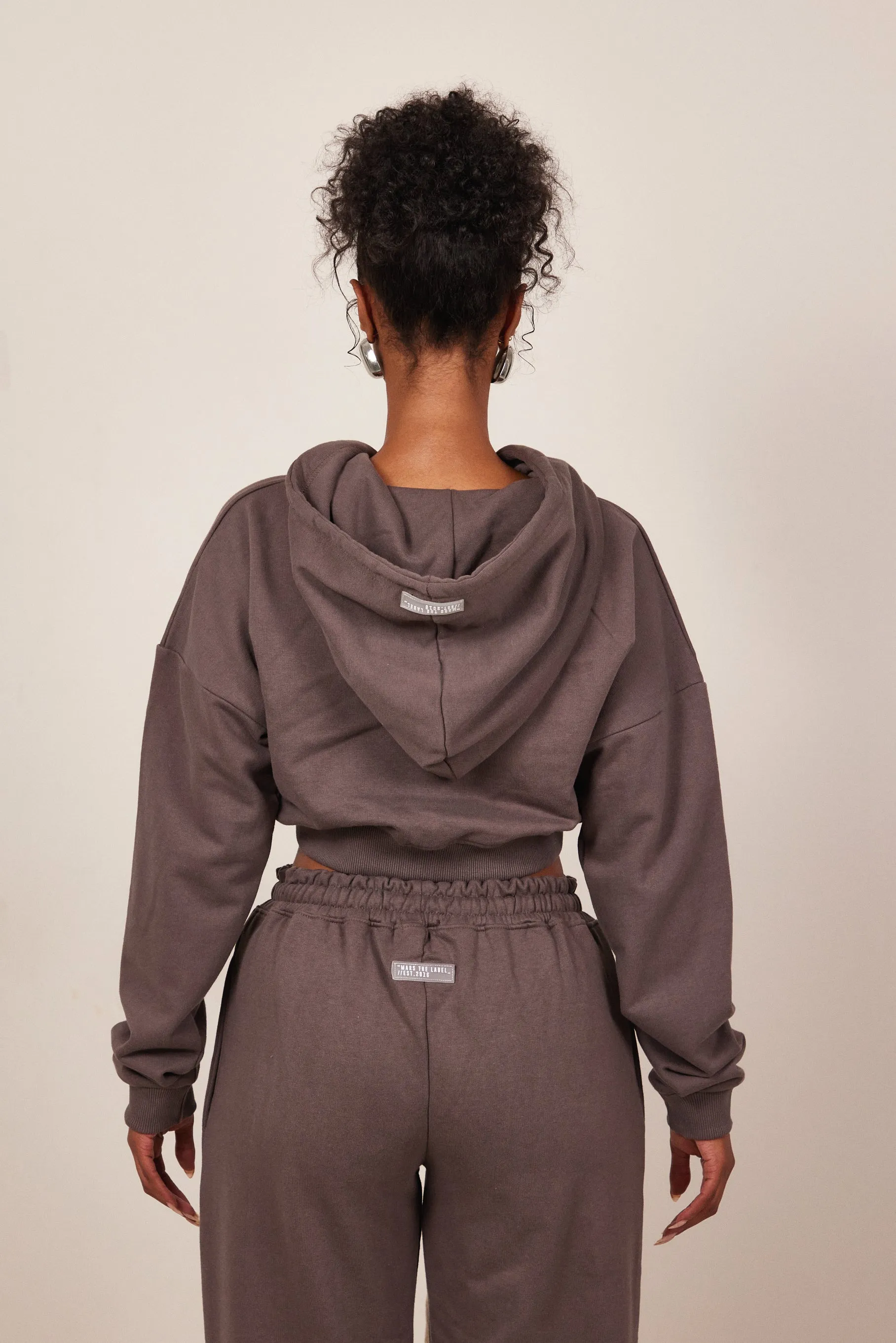 The Mars Curve Hem Zip Jacket